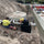 Two plumbers installing storm water. 