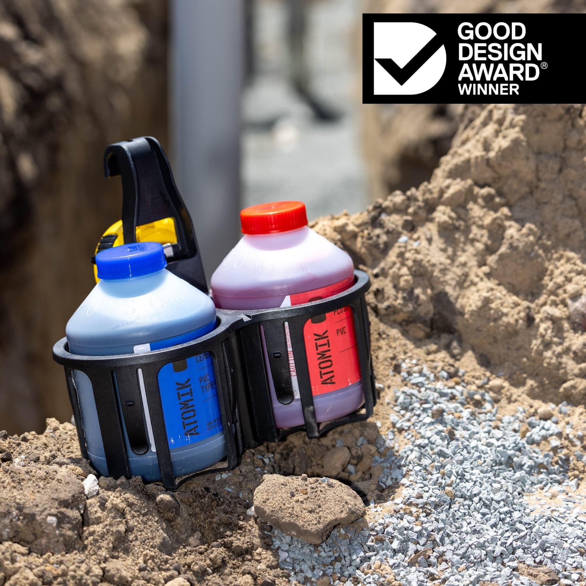 Black constricta multi pot grip holdings solvent cements - winner of the good design award 